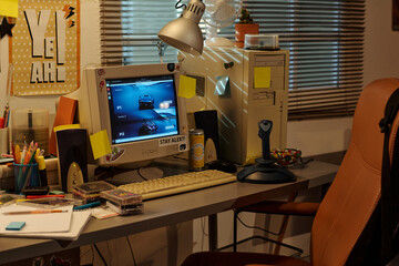 Well-organized workspace featuring vintage computer, various office supplies, and unique...