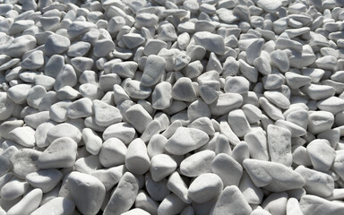 Obraz premium Pile of white decorative stones close-up