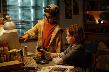 Boys engaging and working on vintage computer setup with various 90s gadgets and snacks. Ambient lighting and retro decor creating nostalgic atmosphere