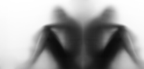 Blurred Silhouette of a Human Figure Conveying Mystery and Introspection