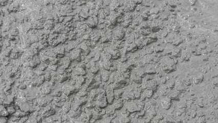 Rough cement texture background, Material wet Concrete mix stone for plaster wall, floor concrete...
