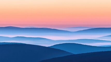 Obraz premium A peaceful sunrise over a misty mountain landscape, the sky blending soft pink, orange, and blue