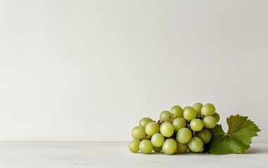 Fresh Green Grapes on White Table Against Textured Background