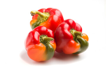 set of multi-colored peppers on a white background