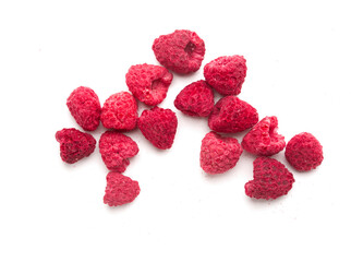 dried raspberries on a white background
