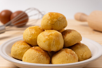 Close up of traditional nastar cookies on a round white plate