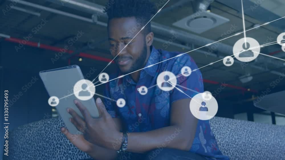 Poster using tablet, man interacting with animation of social network connections in school