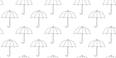 Repeated pattern of umbrellas on a simple white background in a minimalist design