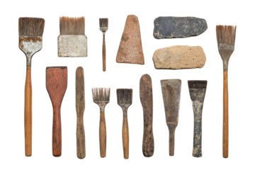 A collection of various tools, including spatulas and scrapers, showcasing different shapes, sizes, and textures.