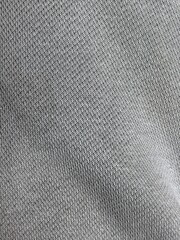 Structured light gray mesh textile with breathable weave texture for modern upholstery, fashion design, and home decor applications.