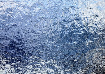 ざらざらした質感の金属の表面の抽象的な背景