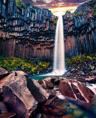 Dramatic morning view of famous Svartifoss (Black Fall) Waterfall.