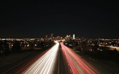 Night City Traffic Light Trails And Skyline