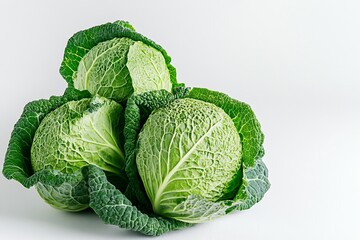 Fototapeta premium Three Fresh Cabbages Nestled Together in Lush Green Leaves Showcased on Light Background : Generative AI