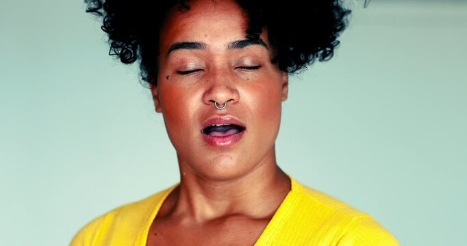 Young woman reacts with shock and unbelief BUT, listens but gradually becomes alleviated to problem becoming relaxed. Person changes emotions from surprise to calm