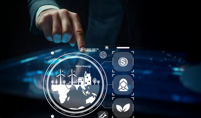 Businessman Interacting with Digital Interface Displaying Wind Energy Concept and Related Icons for Renewable Energy and Sustainability Solutions