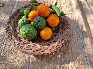 Fresh Bergamot Citrus and oranges in a woven basket