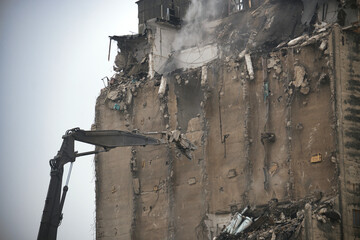 Demolition Process of an Industrial Building Using Excavator Equipment