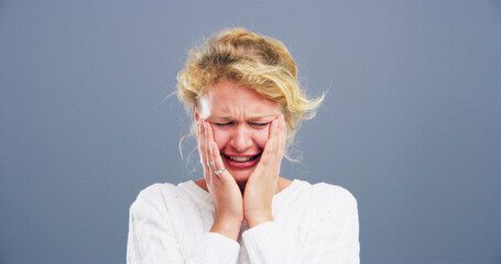 Sad, crying and unhappy woman with stress for mental health crisis, disaster and broken heart....
