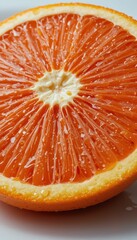 Freshly Cut Juicy Orange Slice with Water Droplets on Surface