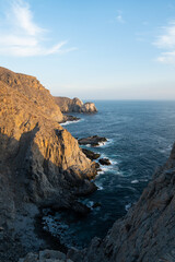 Punta Lobos in BCS, Mexico, golden hour. Rocky shore cliffs next to the Pacific Ocean