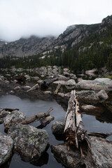 Misty morning view of lake and mountains in Rocky Mountain National Park