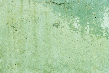 Dirty plaster damaged by time.