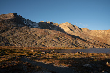 Sunrise light on mountain peaks in Mount Evans, Colorado