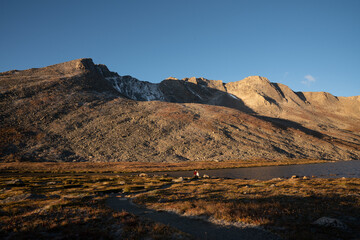Sunrise light on mountain peaks in Mount Evans, Colorado