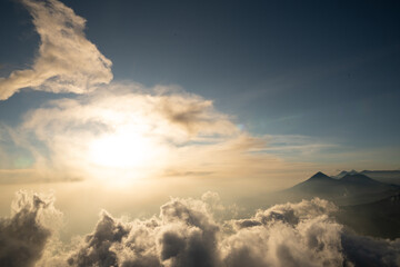  sunset view above the clouds, seen from the summit of Acatenango volcano in Guatemala.