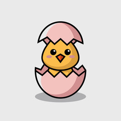 Fototapeta premium Happy Yellow Chick Peeking from a Cracked Egg