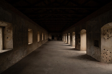 Obraz premium Ancient Corridor in Historic Guatemalan Monastery