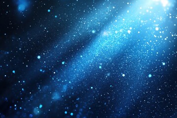 Fototapeta premium Blue glitter bokeh background, perfect for festive designs. Ideal for adding sparkle and magic to your projects, cards, or websites.