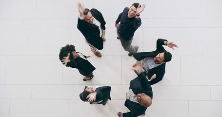 Business, circle and people with celebration in office for corporate target, sales achievement or team building. Above, professional employees or huddle for company success, financial goals and pride