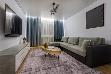 Cozy Living Room with Modern Art and TV