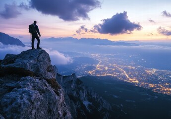 man on top of mountain
