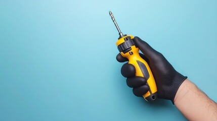 Naklejka premium Handheld electric screwdriver in action workshop tool photography creative space close-up diy projects