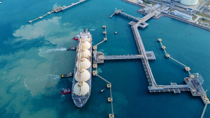 LNG (Liquified Natural Gas) tanker anchored in Gas terminal gas tanks for storage. Oil Crude Gas...