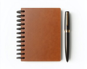 A brown spiral notebook is placed next to a black pen on a white background, emphasizing a simple yet elegant writing setup.