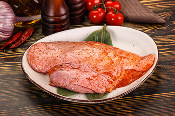 Raw marinated duck breast for cooking