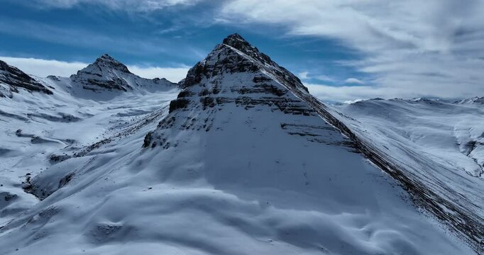 Aerial footage of beautiful high altitude mountains and lakes landscape