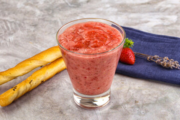 Sweet strawberry smoothie with milk