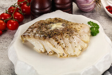 Baked cod fish fillet with spices