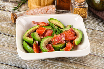 Salad with avocado and salmon