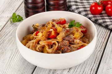Asian udon noodles with beef