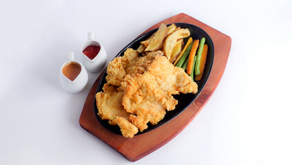 chicken steak, vegetables and sauce