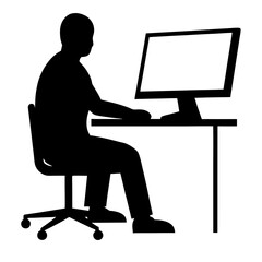 Silhouette of a person working on a laptop at a desk in an office