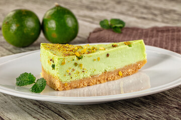 Green pistachio cheesecake served mint