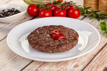 Grilled juicy beef cutlet for burger