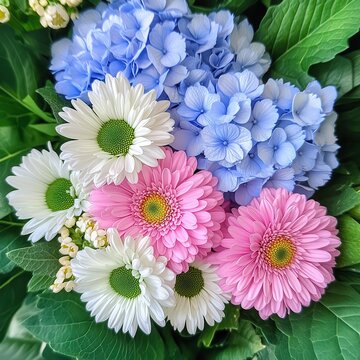 Colorful Floral Arrangement with Pink, Blue, and White Flowers on Green Leaves Perfect for Spring Decor and Celebrations